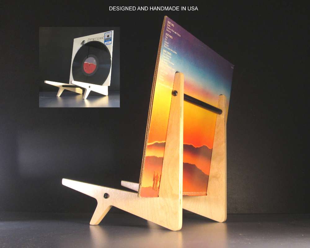 a leaning record stand with mid century modern lines holding a record sleeve handmade in USA
